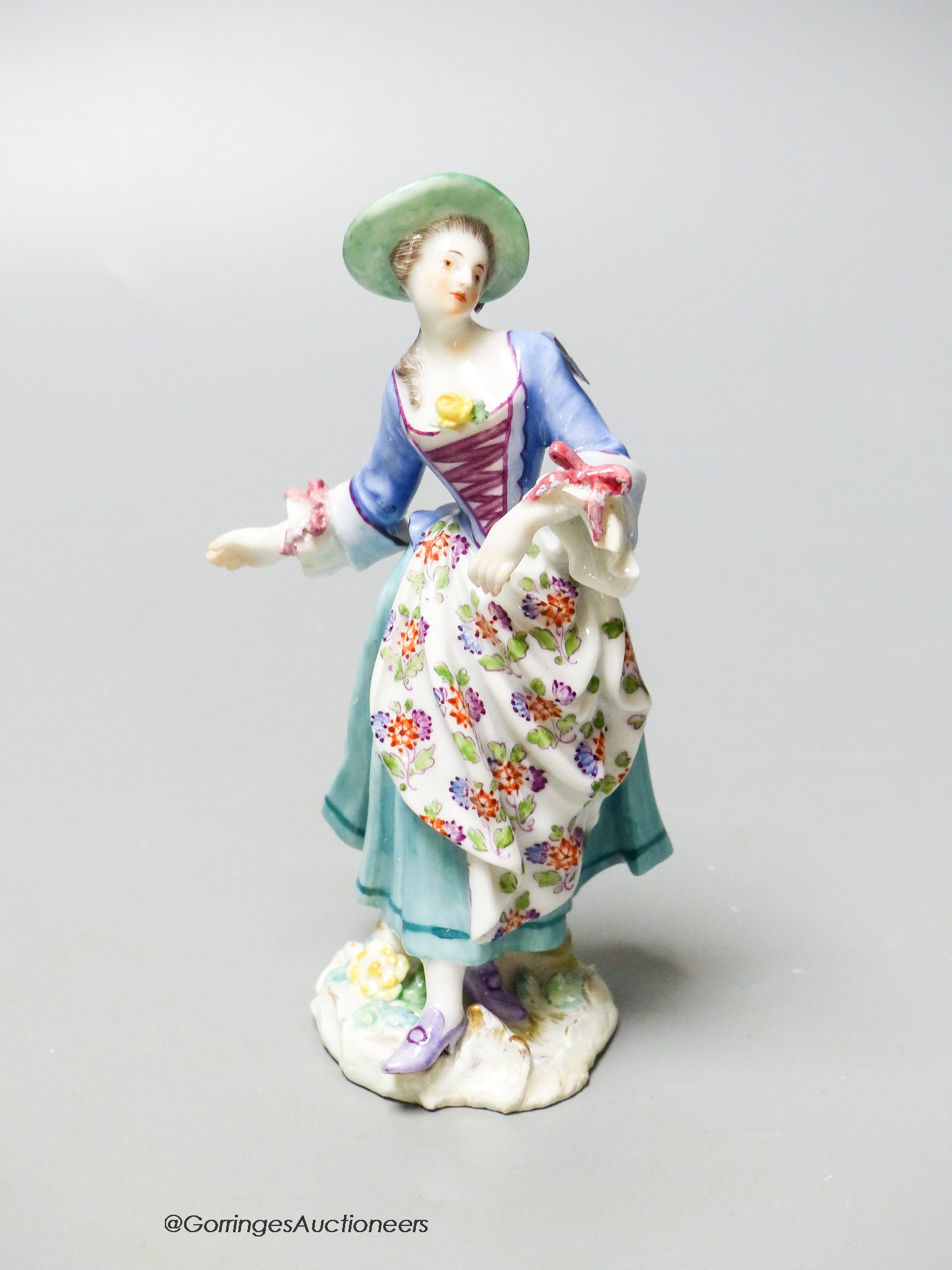 A Meissen figure of a dancing lady, 18th/19th century, height 13cm